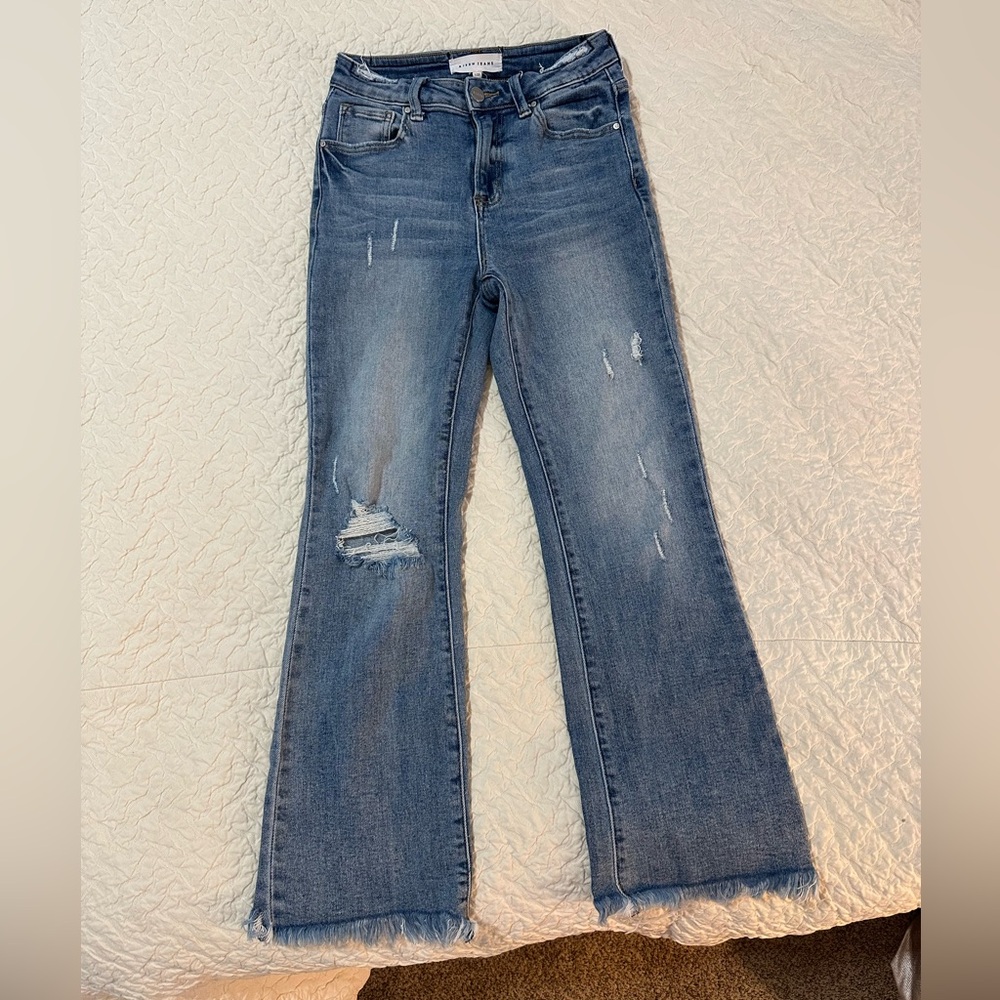 Distressed Blue Jeans